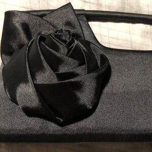LIKE NEW Elegant Structured Satin Black Clutch Purse with Rosette detail